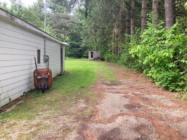2503 Milford Road Parma, MI 49269 - Photo 6 of 13 Side of Garage leading to Middle