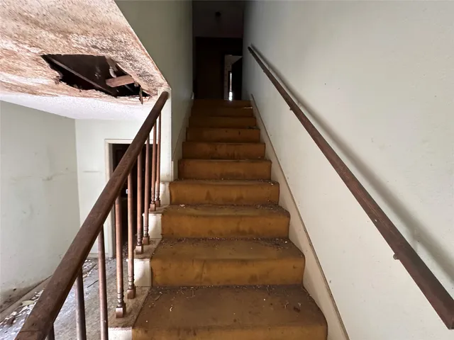 a view of a living room and a patio