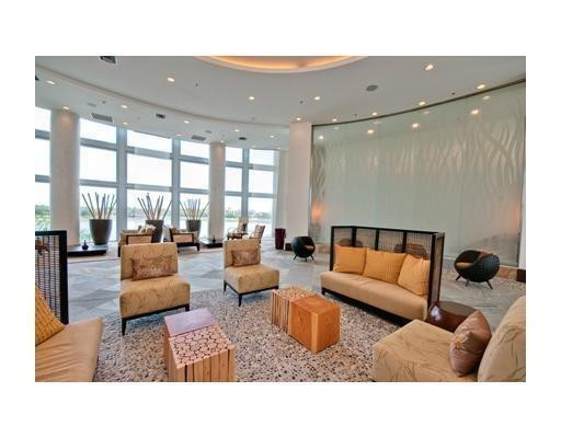 2681 North Flamingo Road, Unit 504 Sunrise, FL 33323 - Photo 13 of 13 a living room with furniture and a large window