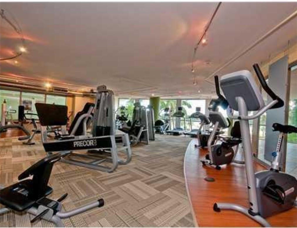 2681 North Flamingo Road, Unit 504 Sunrise, FL 33323 - Photo 3 of 13 a view of a room with gym equipment