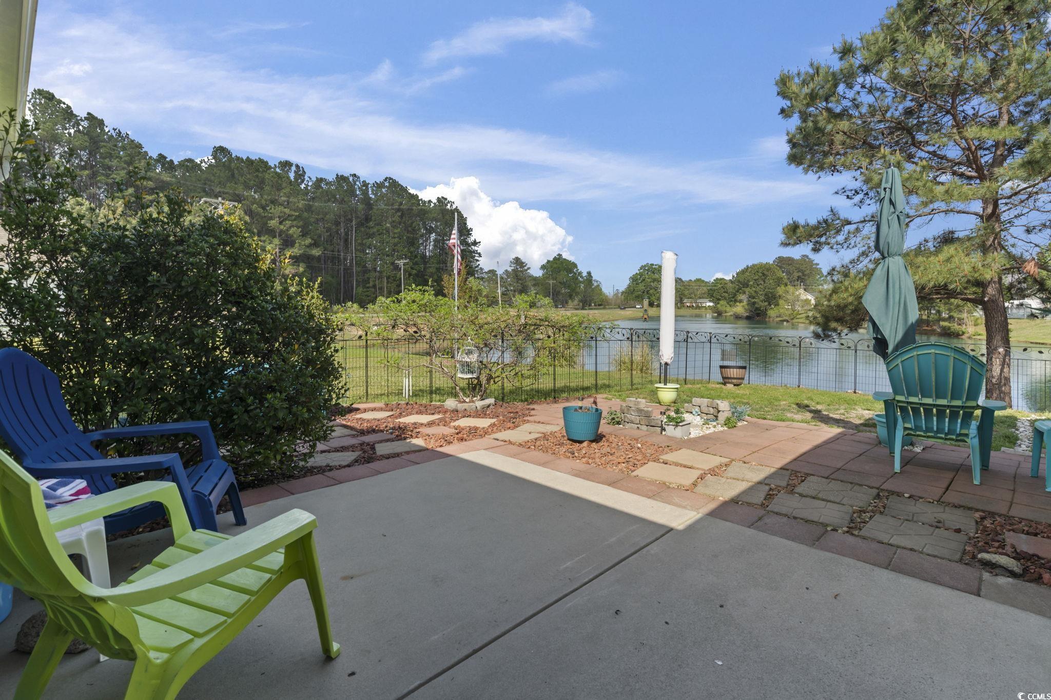 105 Windsor Springs Road Conway, SC 29527 - Photo 20 of 35 View of patio with fence private yard and a water