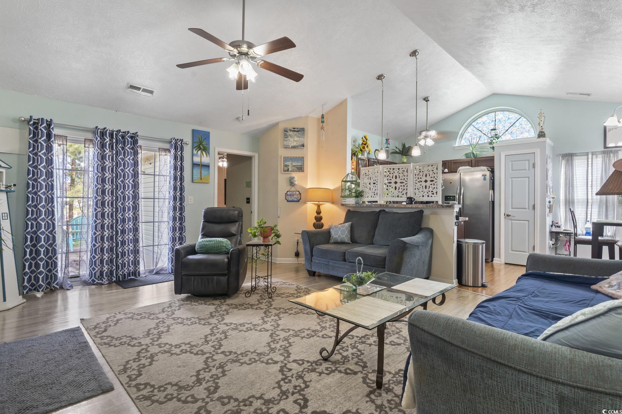 105 Windsor Springs Road Conway, SC 29527 - Photo 5 of 35 Living area featuring light wood-style flooring, a