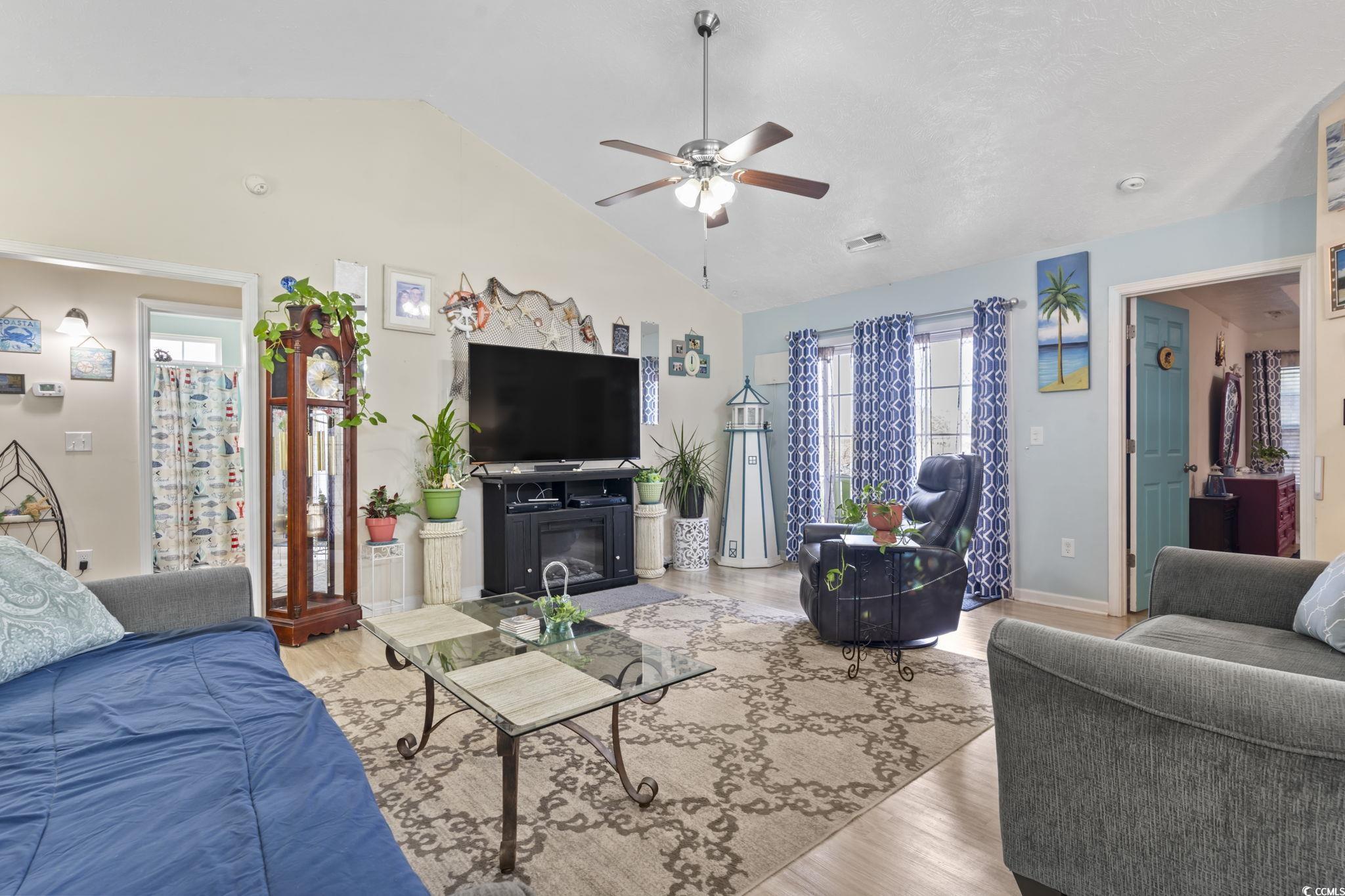 105 Windsor Springs Road Conway, SC 29527 - Photo 7 of 35 Living area featuring visible vents, baseboards, a