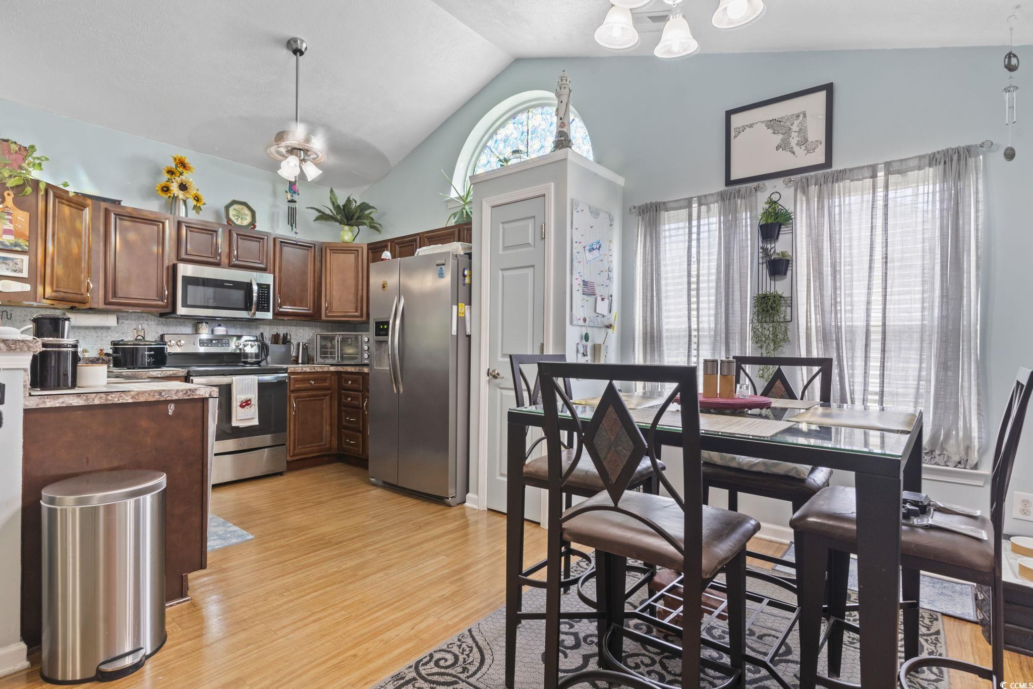 105 Windsor Springs Road Conway, SC 29527 - Photo 8 of 35 Kitchen with light countertops, pendant lighting,