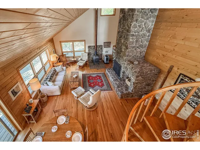 a bedroom with a bed and a television