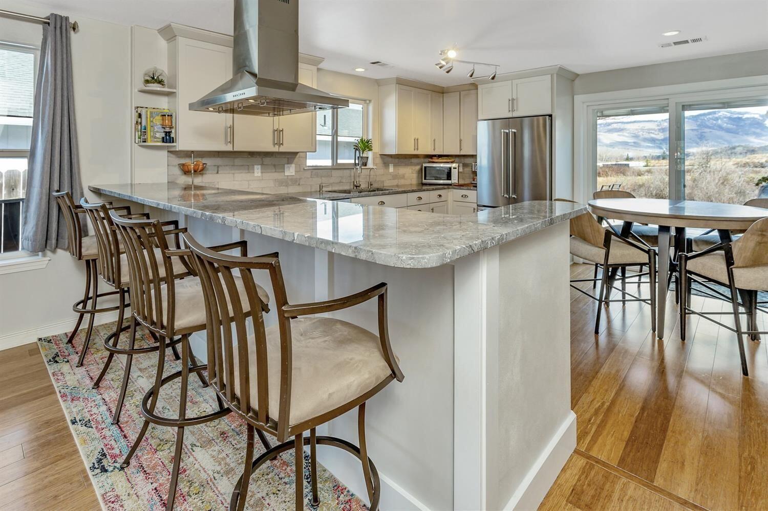942 Spring Way Ashland, OR 97520 - Photo 10 of 35 Kitchen with views to the east and sliders to patio