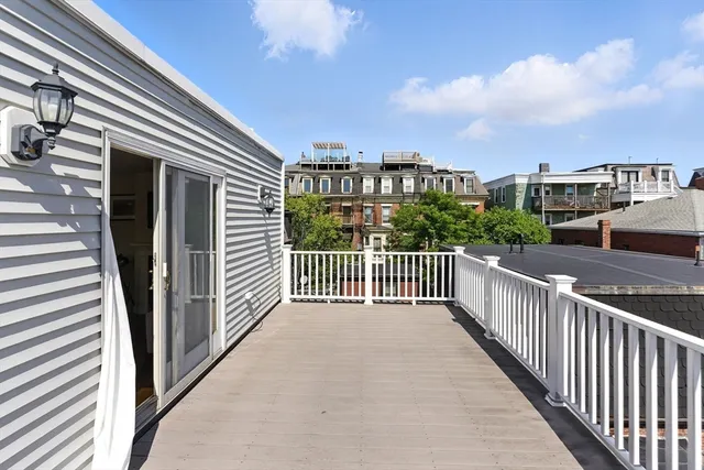 a view of a balcony with city view