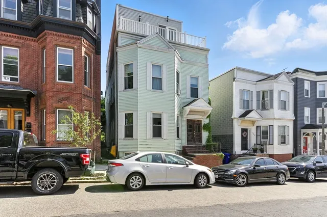 a car parked in front of a building