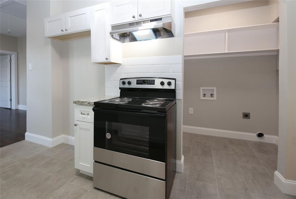 4445 Rusk Street Houston, TX 77023 - Photo 43 of 50 Unit #4 in-unit utility room is located off the kitchen.