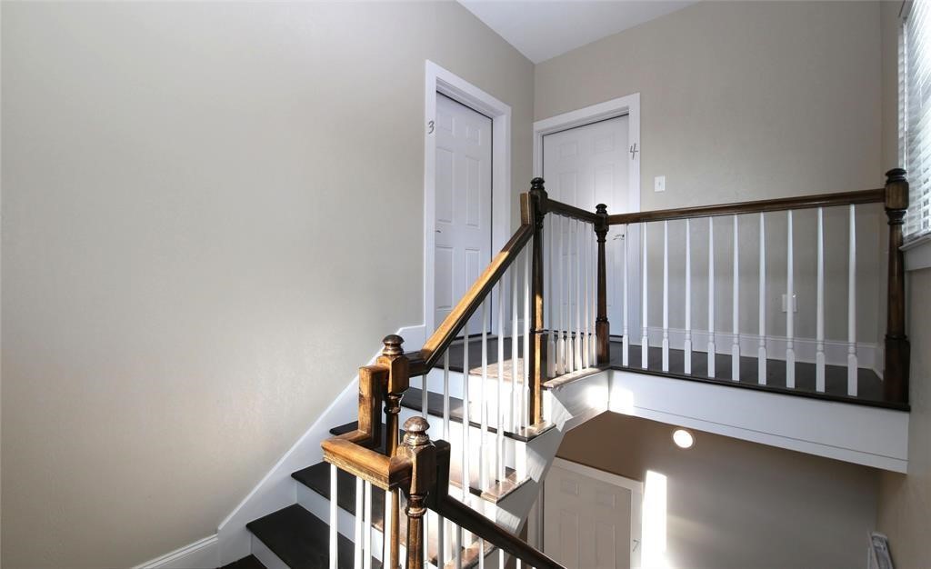 4445 Rusk Street Houston, TX 77023 - Photo 10 of 50 Common area stairs that lead to the top 2 units.