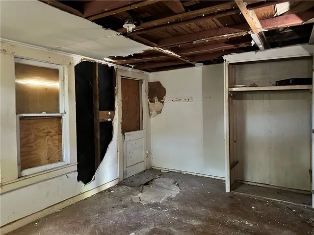 a view of walk in closet with window