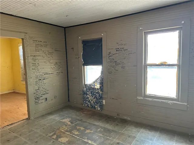 a view of a room with windows