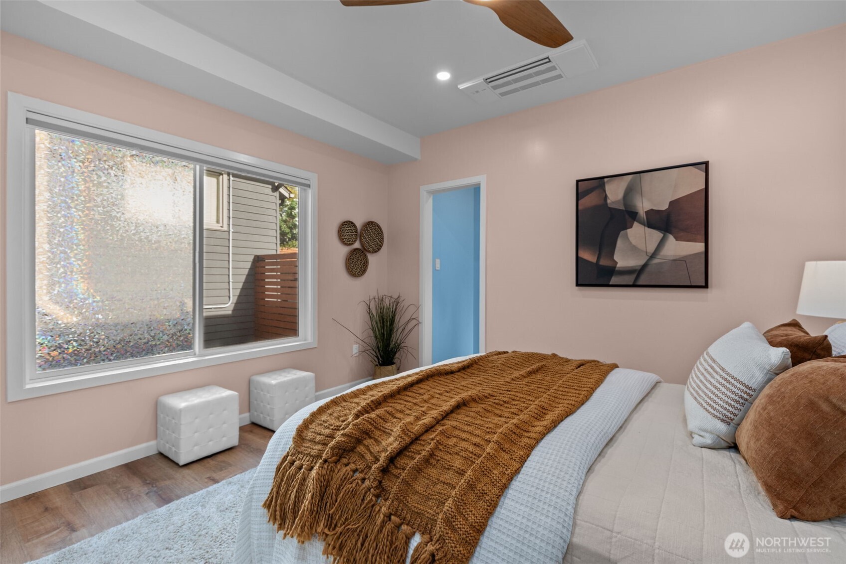 11 West Fulton Street Seattle, WA 98119 - Photo 17 of 40 a bedroom with a large bed and a window