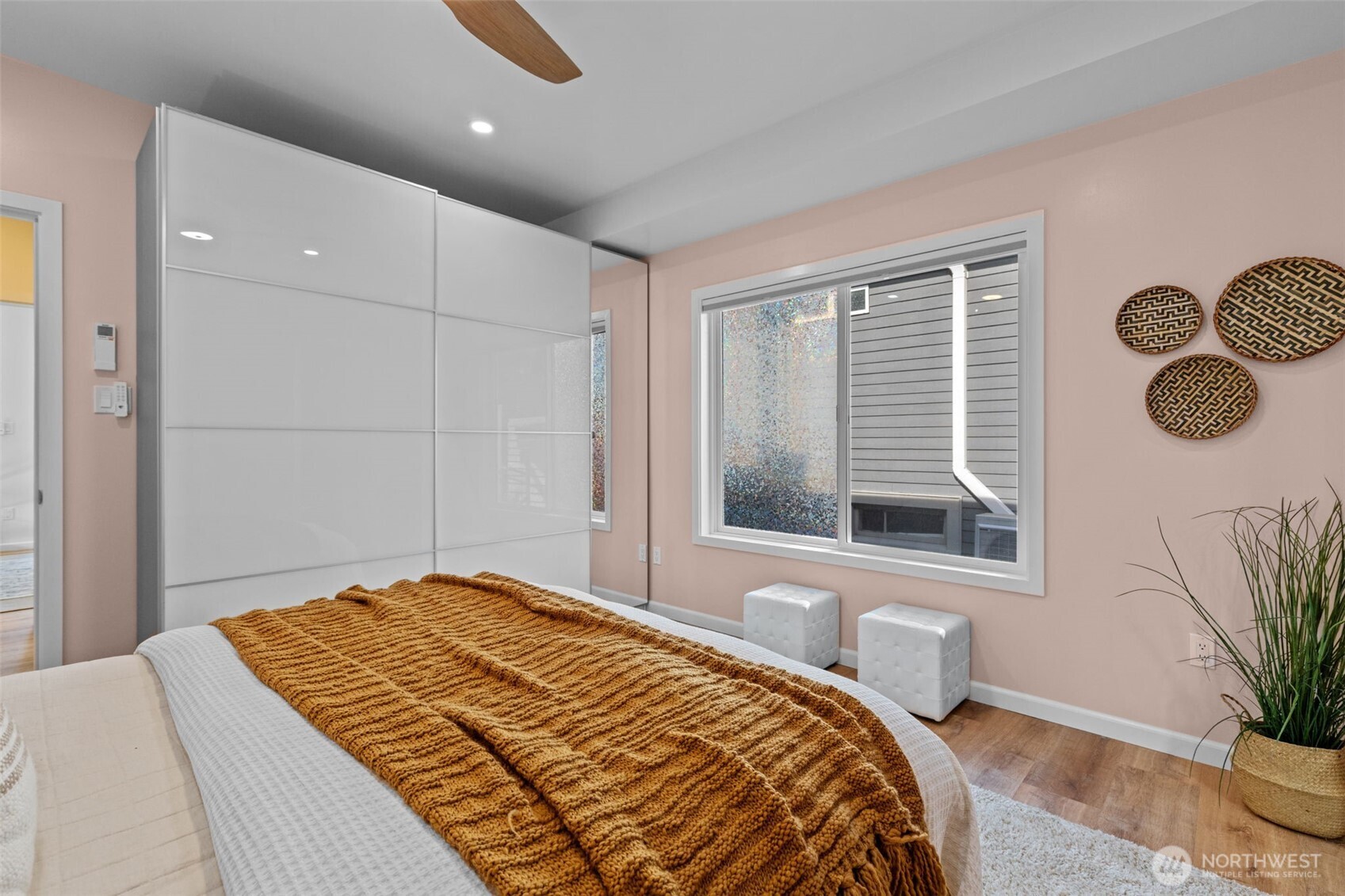 11 West Fulton Street Seattle, WA 98119 - Photo 19 of 40 a bedroom with a large bed and a window