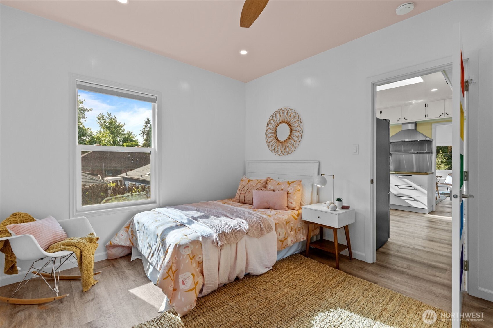 11 West Fulton Street Seattle, WA 98119 - Photo 20 of 40 a bedroom with a bed and window