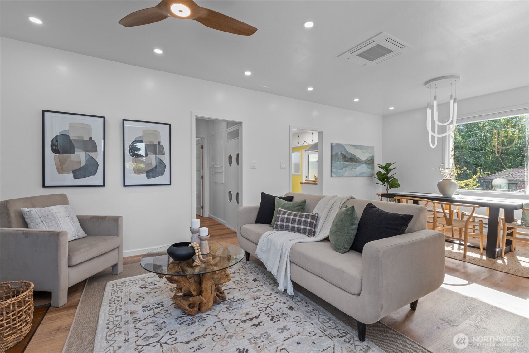 11 West Fulton Street Seattle, WA 98119 - Photo 2 of 40 a living room with furniture and wooden floor