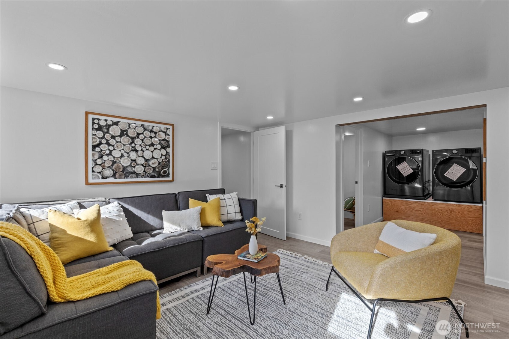 11 West Fulton Street Seattle, WA 98119 - Photo 24 of 40 a living room with furniture and wooden floor