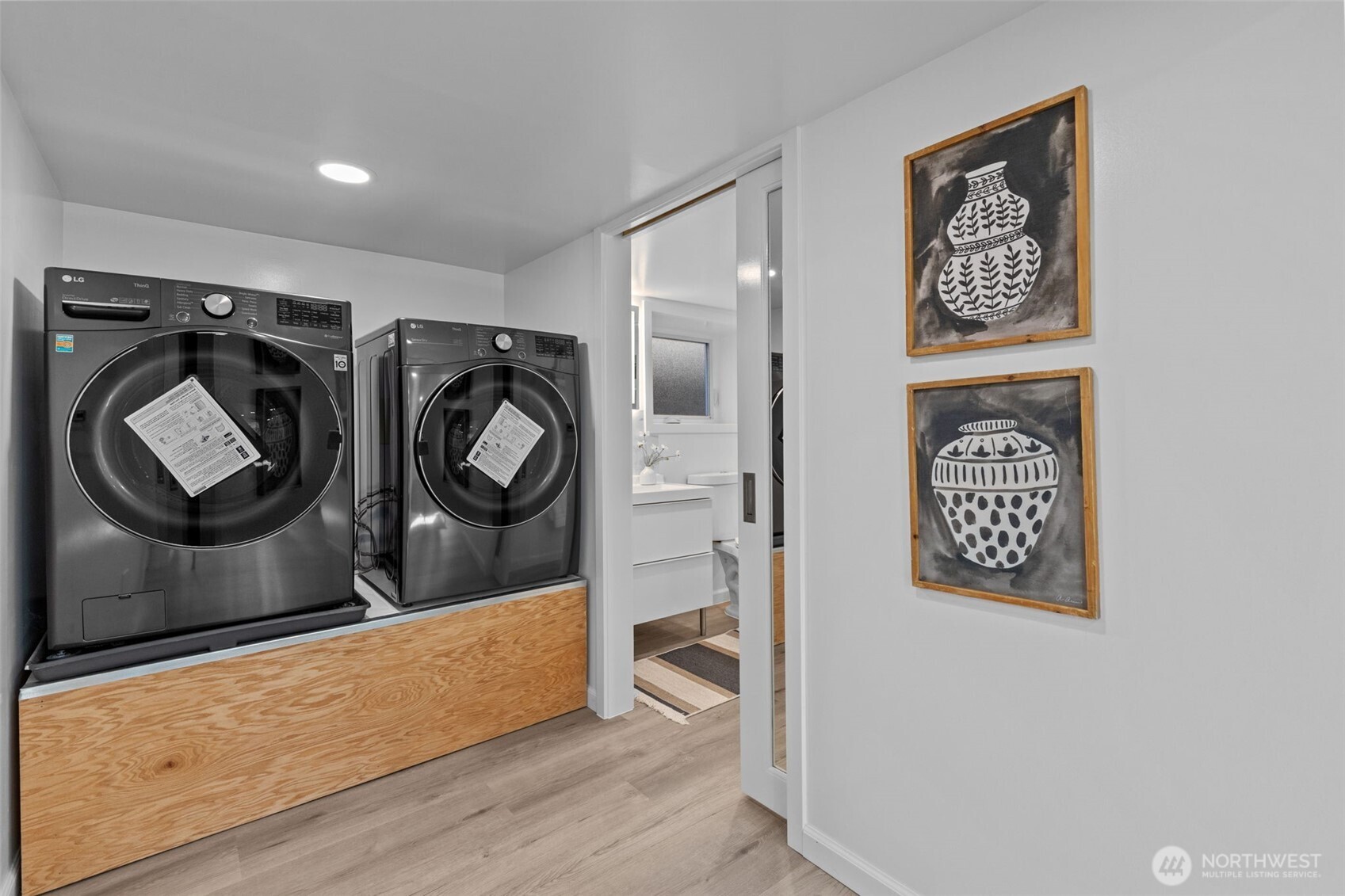 11 West Fulton Street Seattle, WA 98119 - Photo 26 of 40 a view of walk in closet with clothes and shoes