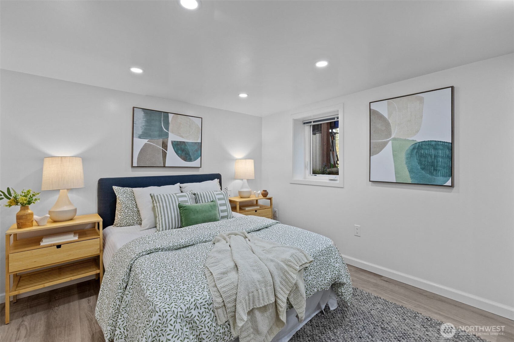 11 West Fulton Street Seattle, WA 98119 - Photo 28 of 40 a bedroom with a bed and a painting on the wall