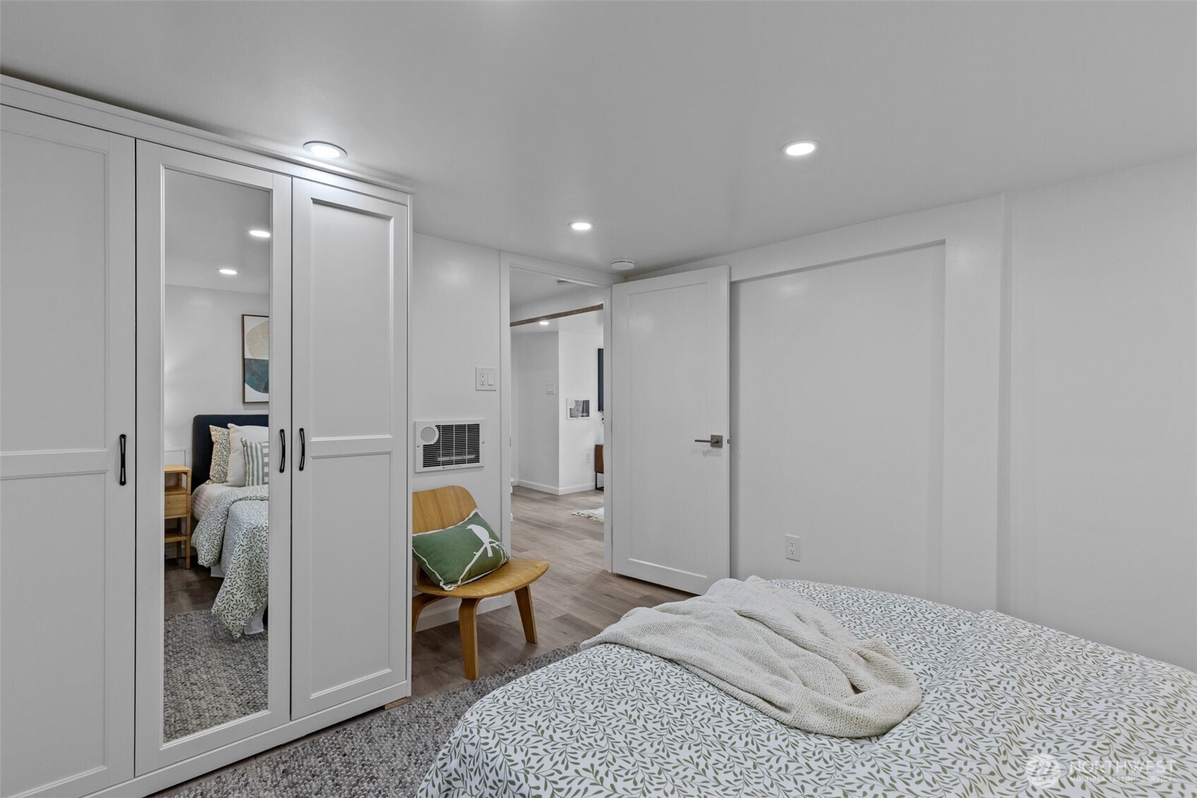 11 West Fulton Street Seattle, WA 98119 - Photo 29 of 40 a bedroom with a bed and a mirror