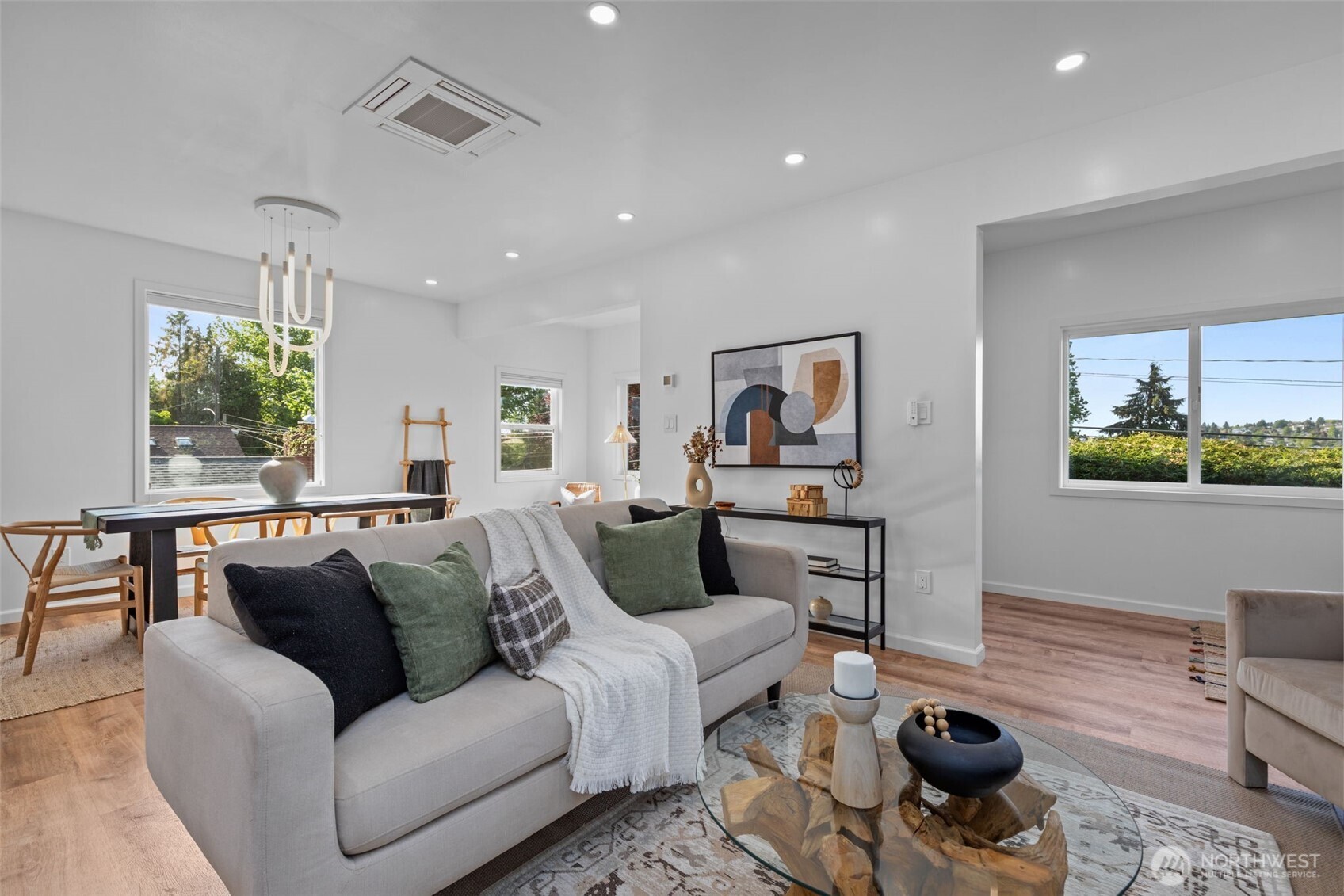 11 West Fulton Street Seattle, WA 98119 - Photo 3 of 40 a living room with furniture and a wooden floor