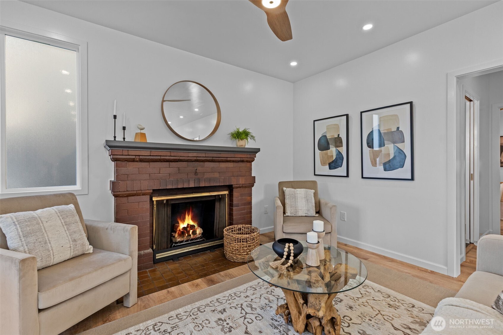 11 West Fulton Street Seattle, WA 98119 - Photo 5 of 40 a living room with furniture a rug and a fireplace