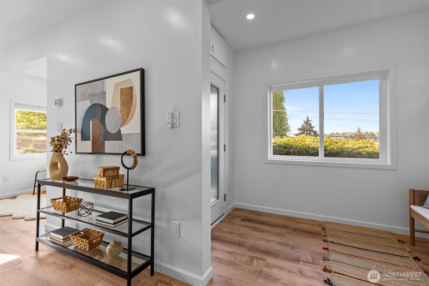 11 West Fulton Street Seattle, WA 98119 - Photo 6 of 40 a bedroom with bed and a window