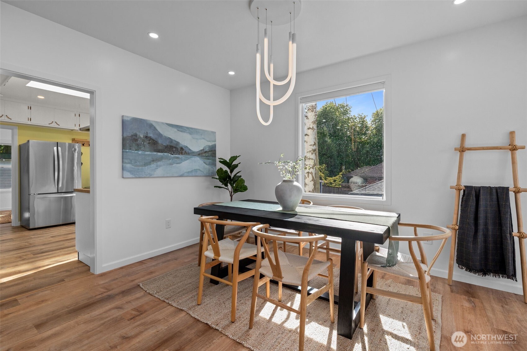 11 West Fulton Street Seattle, WA 98119 - Photo 8 of 40 a view of a dining room with furniture window and wooden floor