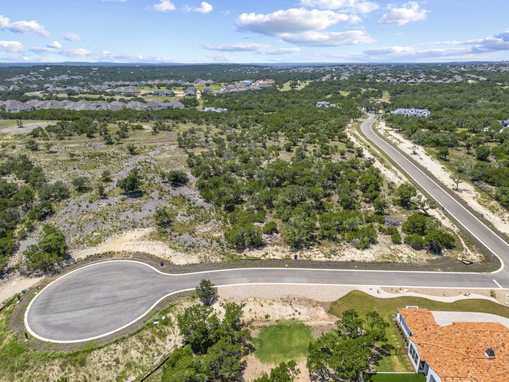 7 B Broadwing Cove Austin, TX 78737 - Photo 6 of 14 a view of a lake with a outdoor space