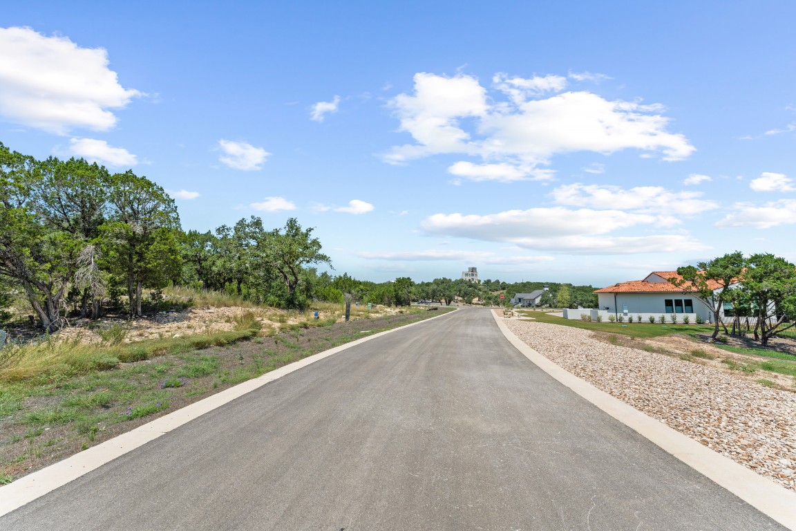 7 B Broadwing Cove Austin, TX 78737 - Photo 7 of 14 a view of a street with a houses