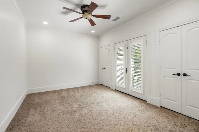 a view of entryway with wooden floor and door