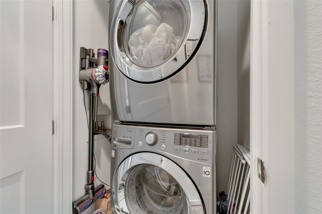 6004 Hudson Street, Unit 102 Dallas, TX 75206 - Photo 18 of 22 a close view of utility room with washer and dryer