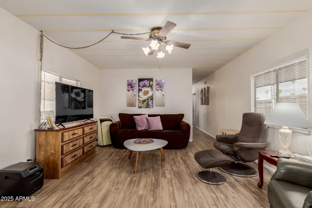 a swimming pool with outdoor seating