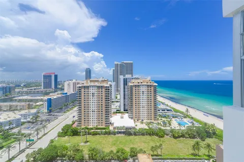 a view of a city with tall buildings