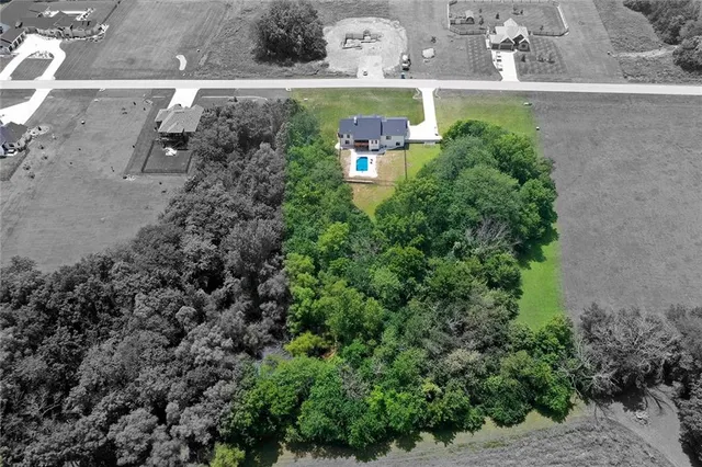 $889,000 | 816 Eve Orchid Drive, Greenwood, MO 64034