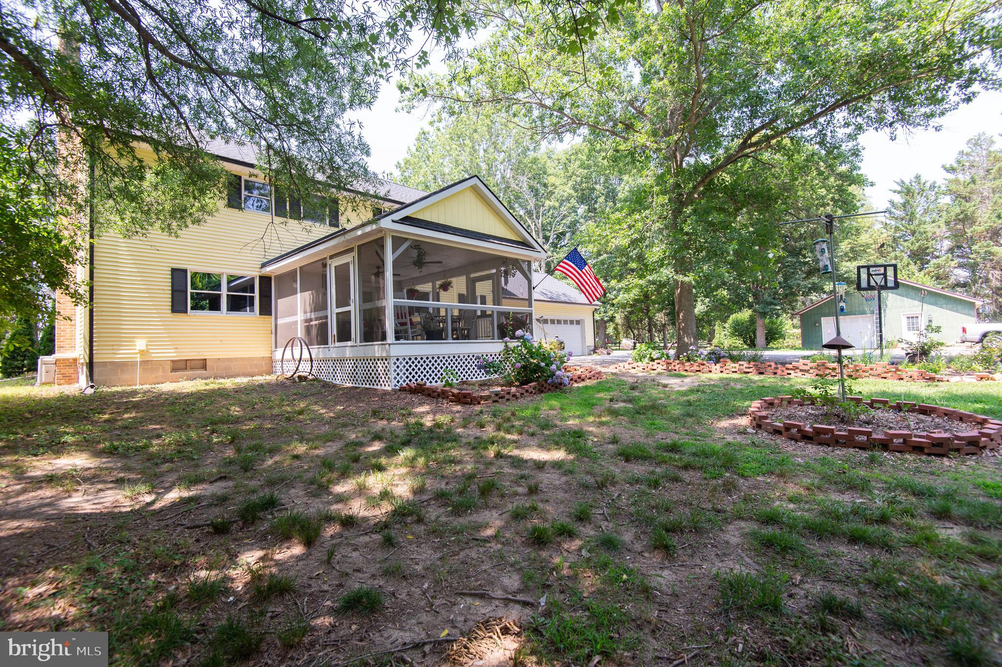 9472 Quail Run Road Denton, MD 21629 - Photo 37 of 50 a view of a house with a yard