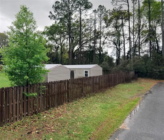 a view of a wooden fence
