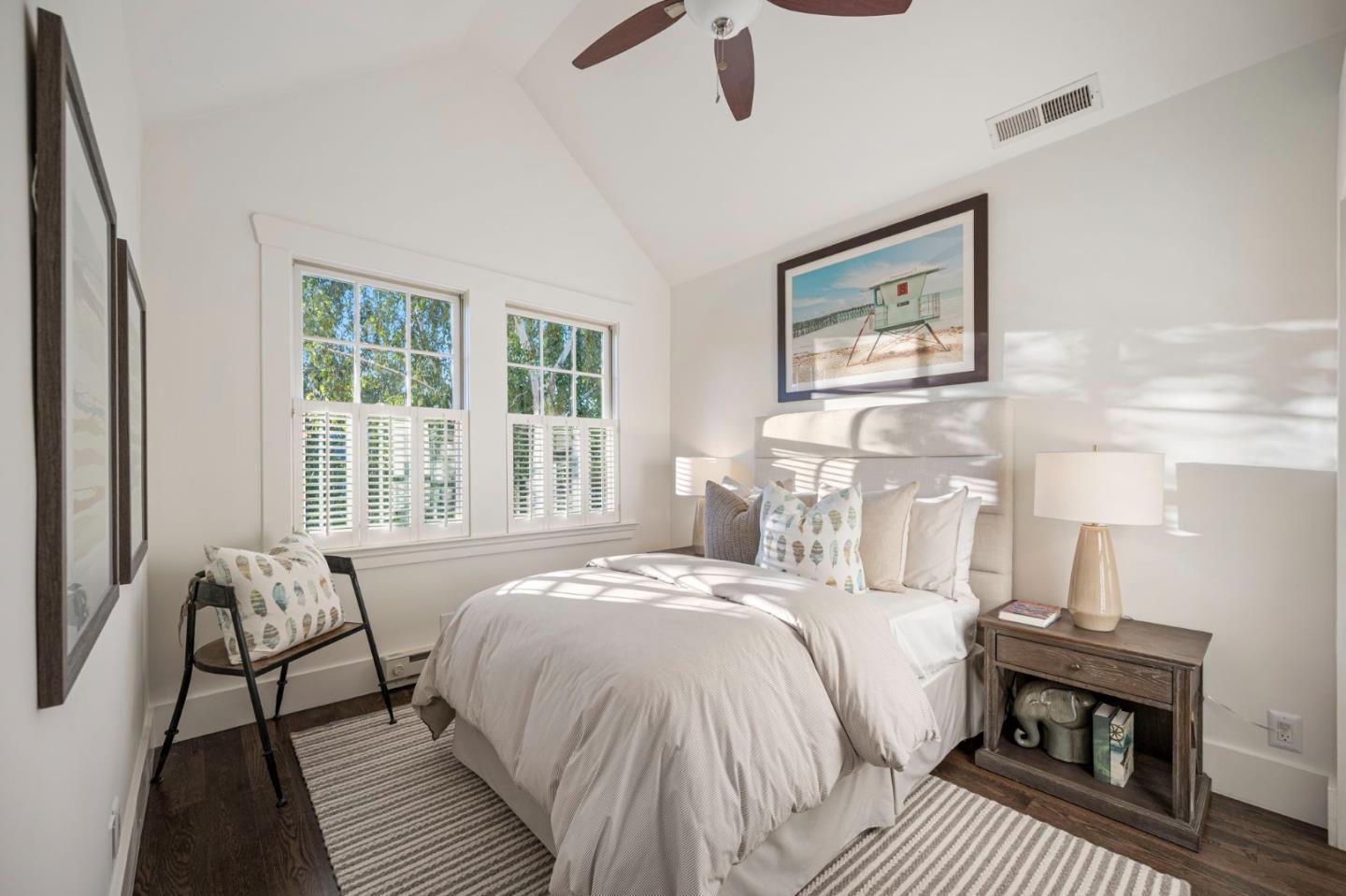 445 Arlington Road Redwood City, CA 94062 - Photo 22 of 50 a bedroom with a bed and wooden floor