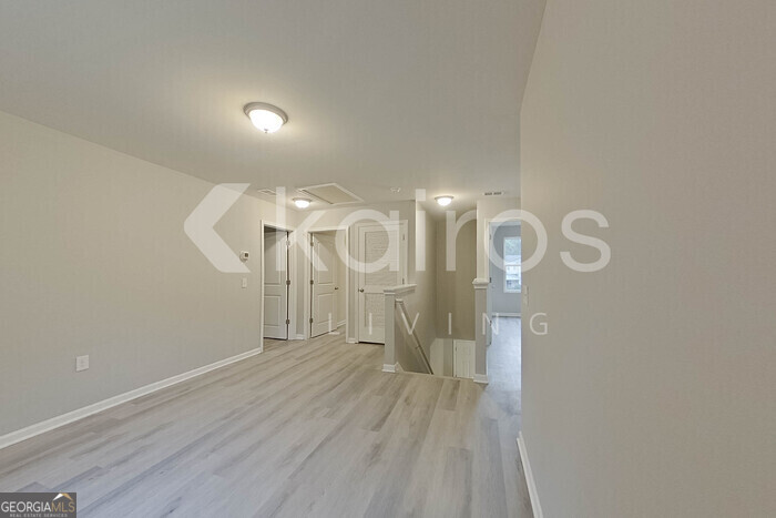 236 Sunrise Circle Midway, GA 31320 - Photo 14 of 31 a view of a room with wooden floor