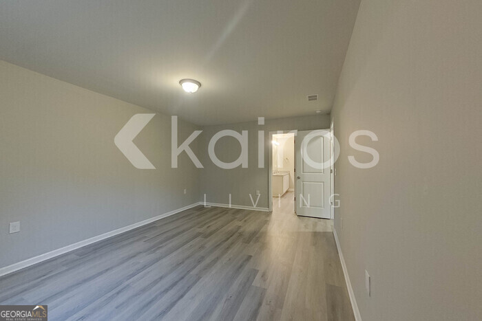 236 Sunrise Circle Midway, GA 31320 - Photo 21 of 31 a view of a room with wooden floor