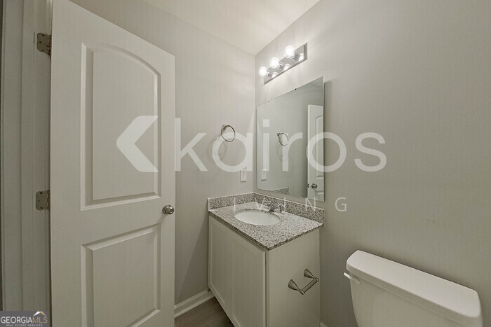 236 Sunrise Circle Midway, GA 31320 - Photo 9 of 31 a bathroom with a sink a toilet and shower