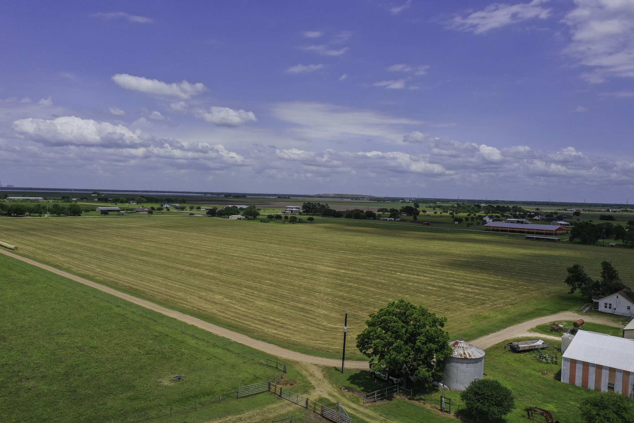 11810 Zamanek Road Needville, TX 77461 - Photo 2 of 30 a view of a lake with a city view
