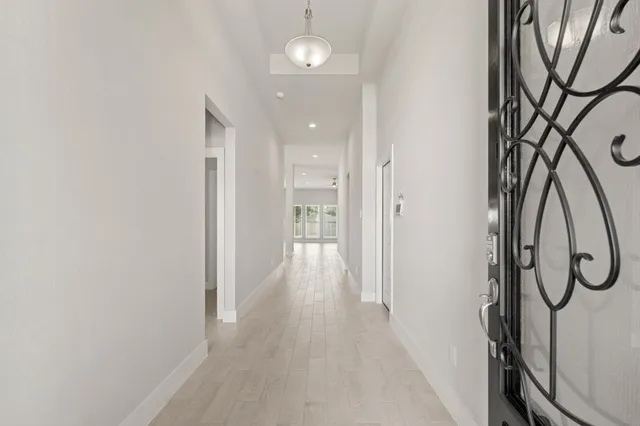 a view of a hallway with painted walls