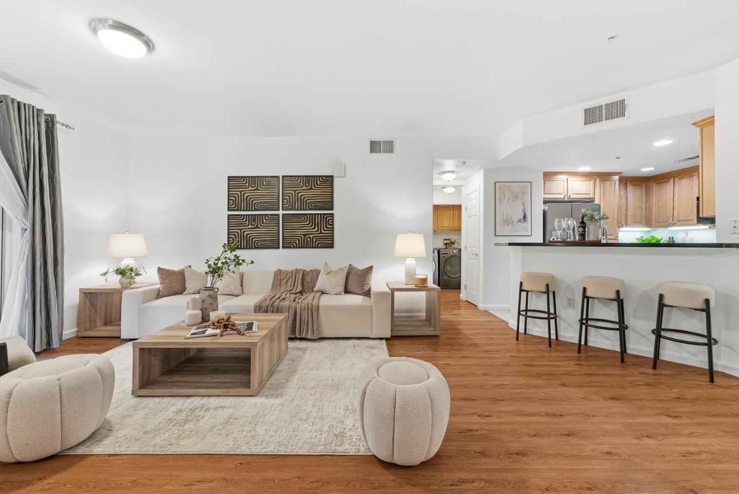 1390 Saddle Rack Street, Unit 223 San Jose, CA 95126 - Photo 3 of 36 a living room with furniture and a large window