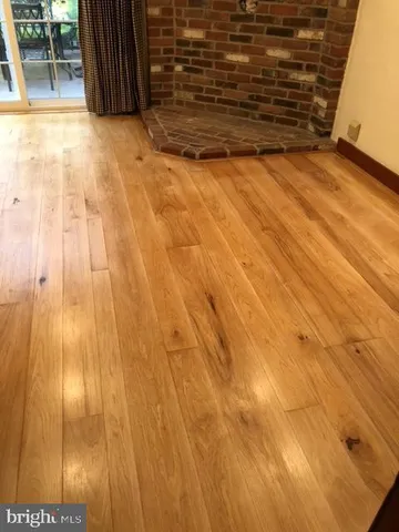 a view of backyard with wooden floor