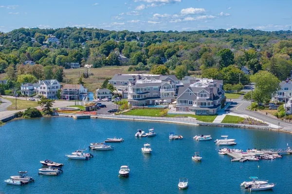 a view of a swimming pool with a table and chairs