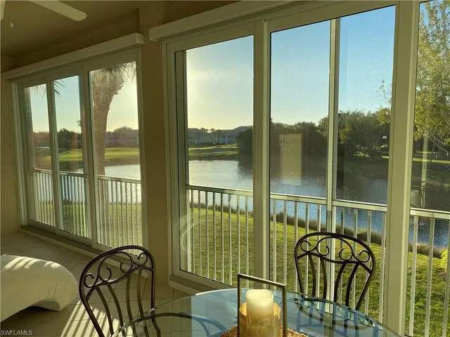 a view of a balcony with chairs
