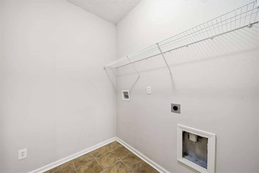 3834 Augustine Place Rex, GA 30273 - Photo 12 of 41 a view of a small space with racks on the wall