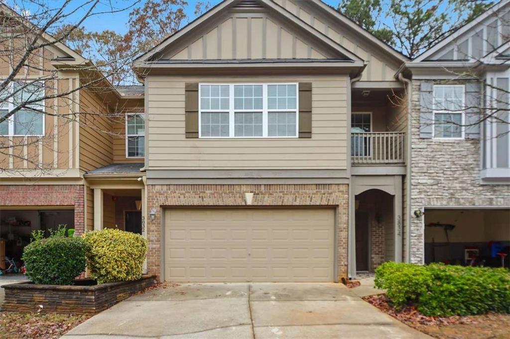 3834 Augustine Place Rex, GA 30273 - Photo 2 of 41 a front view of a house with garden