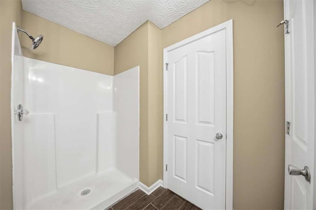 3834 Augustine Place Rex, GA 30273 - Photo 37 of 41 a bathroom with a shower